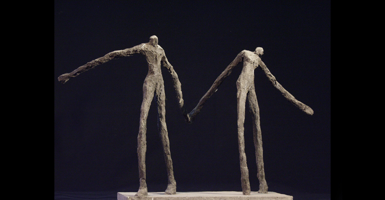 Couple de personnages en béton. Sculpture de Philippe Doberset