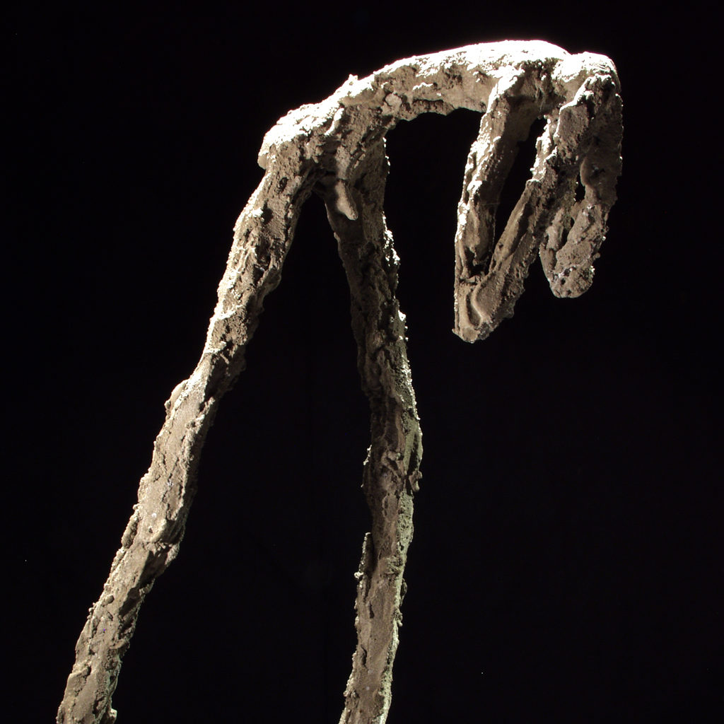 Un personnage en ciment en douleur Sculpture de Philippe Doberset