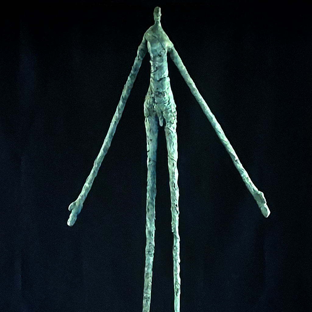 Sculpture en bronze de Philippe Doberset représentant un grand homme bras écartés