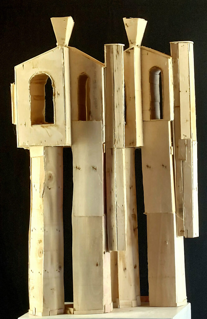 Coffrage en bois pour sculpture en béton représentant deux  personnages cubistes. Sculpture de Philippe Doberset